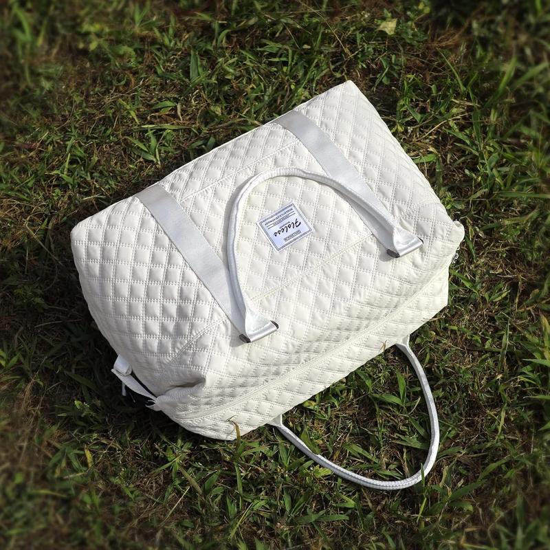 VoyageQuilt – Water-Resistant Travel Duffel Bag