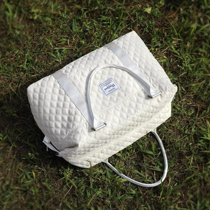 VoyageQuilt – Water-Resistant Travel Duffel Bag